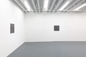 Gallery view of two works.