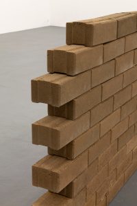 Edge of a brick wall.