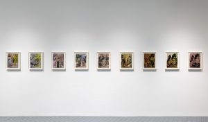 A series of works all the same size in white frames. The surfaces appear similar to that of the bronze works with more vivid colors. The colors become darker and the use of black increases from left to right, indicating the passage of time.