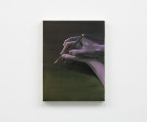 A purplish hand holds another handing, appearing to draw a line.